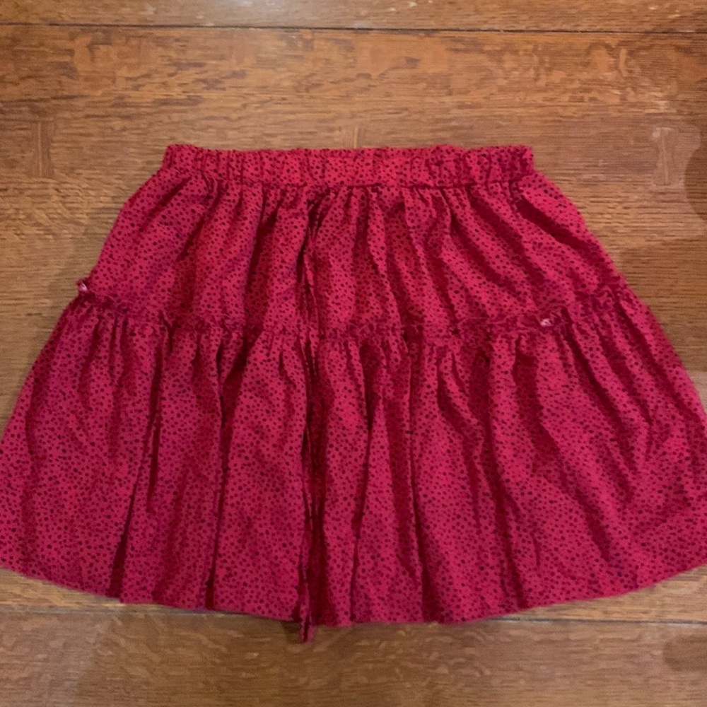 Skirt, mid length, red w/ black,  Size L.
